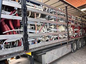 2 trucks loaded with hospital beds and chairs