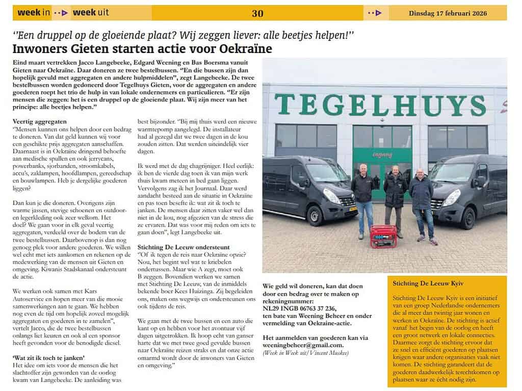 Tegelhuy's winkel met donatiebus en vrijwilligers.